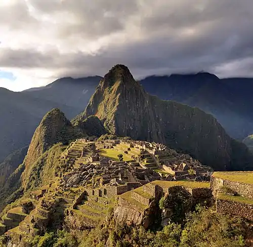 Image 4Machu PicchuPhoto: Martin St-AmantMachu Picchu, with the peak Huayna Picchu behind it. Perhaps the most famous Inca site, Machu Picchu is situated on a mountain ridge above the Urubamba Valley in Peru. It was probably built as an estate for the Inca emperor Pachacuti in the 15th century, but abandoned soon after during the Spanish conquest of the Inca Empire. Although known locally, it was unknown to the outside world before being brought to international attention in 1911 by the American historian Hiram Bingham, and it is now an important tourist attraction.More featured pictures