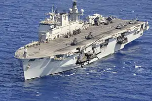 Apache helicopter takes off from HMS Ocean during Operation Ellamy