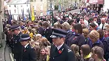 Image 56Scouts, Brownies, and Cubs with the local community in Tiverton, Devon on Remembrance Sunday (from Culture of the United Kingdom)