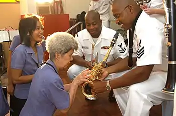 Members of the Seventh Fleet band engaging in cultural diplomacy at the Pattaya Redemptorist School for the Blind.